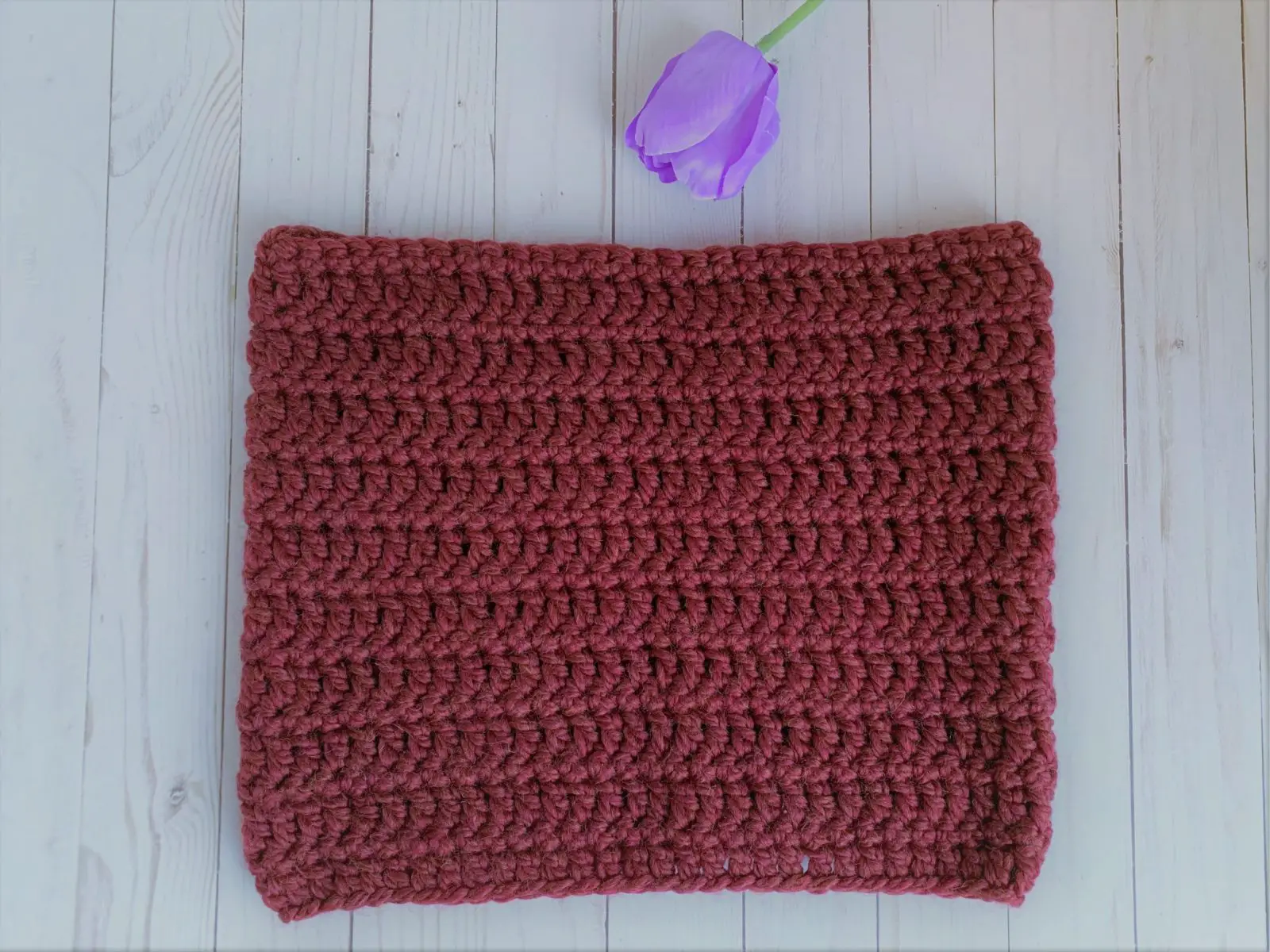 Garnet Cowl with a purple tulip to side