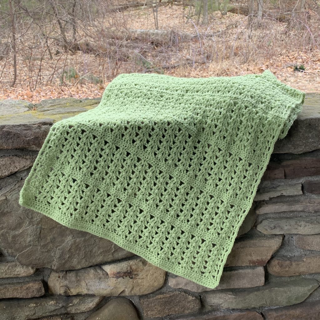 "Lettuce Wrap" displayed on a rock wall. 